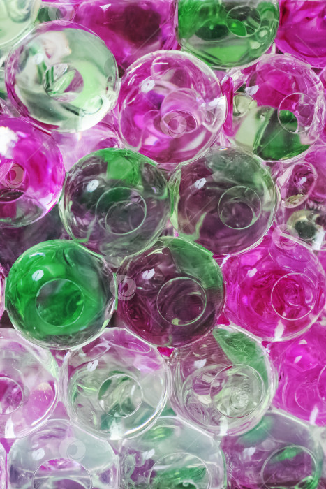 Скачать Абстрактный фон из розовых и зеленых маленьких шариков фотосток Ozero