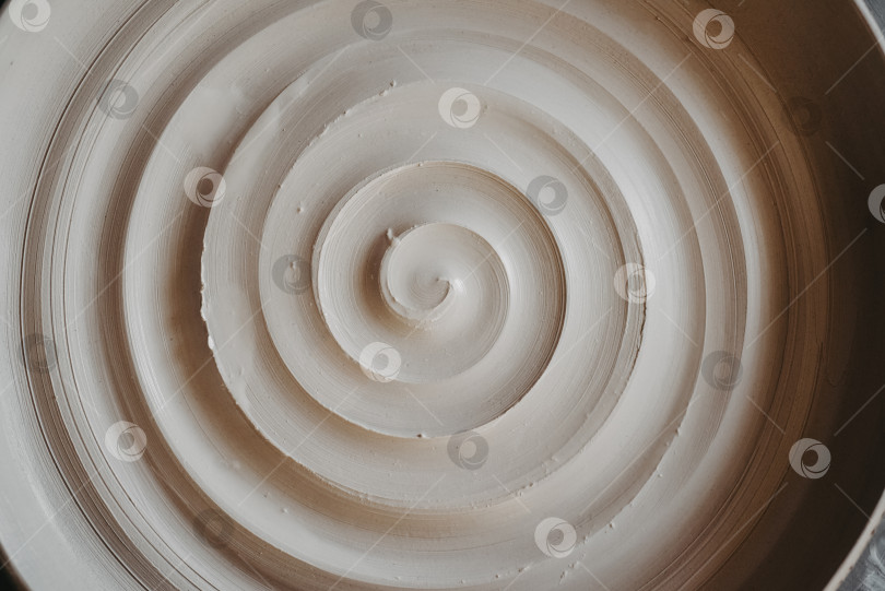 Скачать Красивая спираль, спиралевидная линия на глиняной поверхности фотосток Ozero