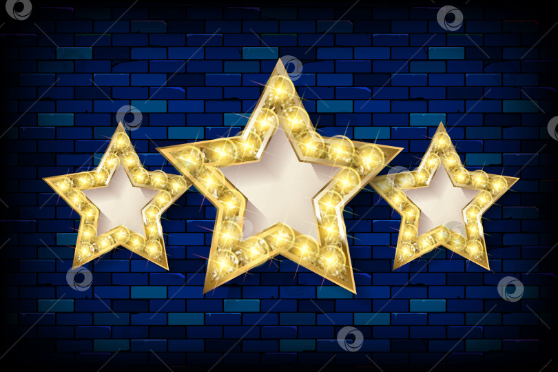 Скачать Три золотые звезды на фоне кирпичной стены. фотосток Ozero