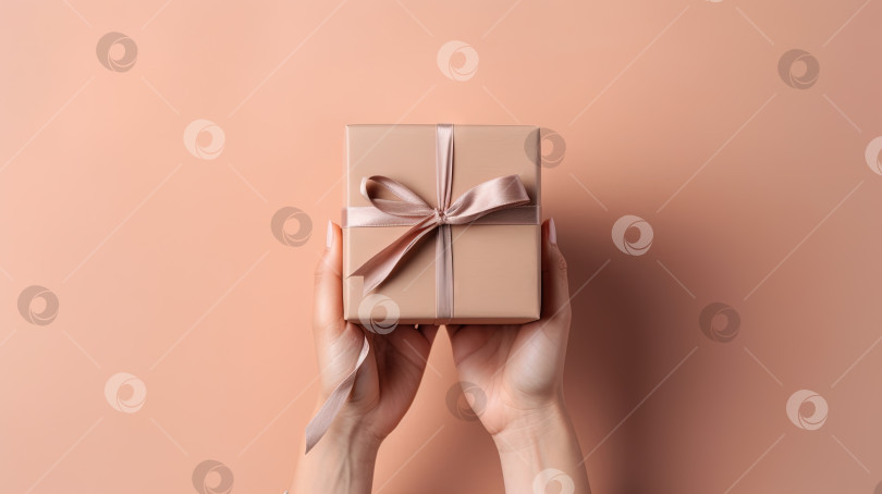 Скачать Руки женщины держат подарок, вручая коробку с бантом. Сгенерированный искусственный интеллект. фотосток Ozero
