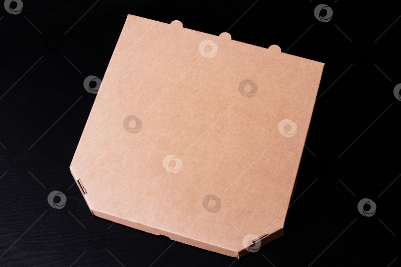 Скачать Коробка для пиццы на деревянном столе место для копирования фотосток Ozero