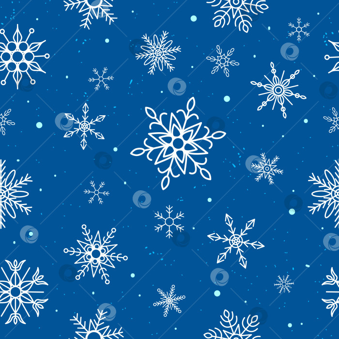 Скачать Бесшовный узор из снежинок на синем фоне фотосток Ozero