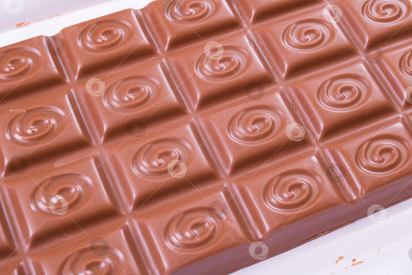 Скачать БЕЛАРУСЬ, НОВОПОЛОЦК - 20 декабря 2020 года: Шоколад Milka крупным планом фотосток Ozero