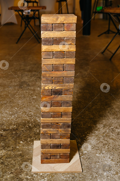 Скачать Создана игра в гигантскую башню из деревянных блоков фотосток Ozero