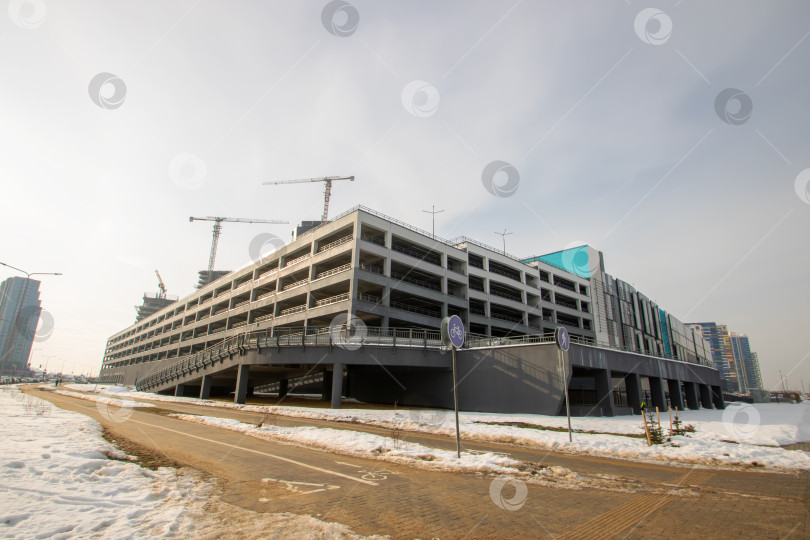 Скачать Беларусь, Минск - 07 февраля 2024 года: Современные дома в мире Минска фотосток Ozero