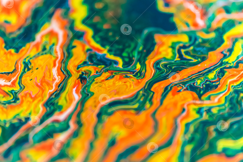 Скачать абстрактный фон из разноцветных чернил в воде крупным планом фотосток Ozero