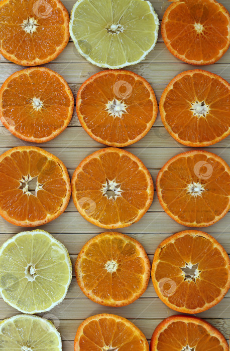 Скачать плоское изображение нарезанных мандаринов и лимонов фотосток Ozero