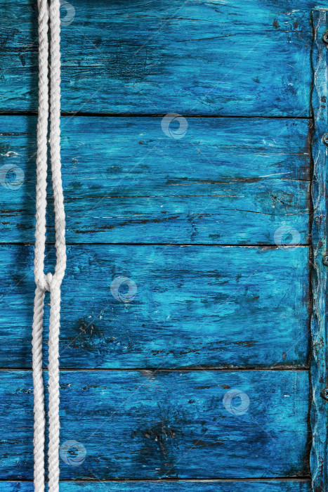 Скачать Белая веревка на темно-синей доске фотосток Ozero