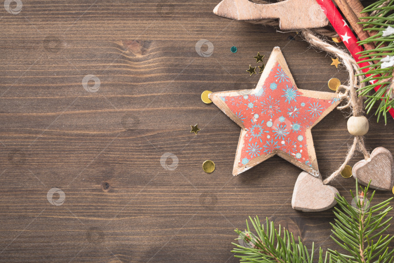 Скачать Деревянный фон с украшением в виде рождественской звезды с копировальным пространством фотосток Ozero