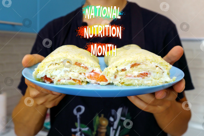 Скачать Отпразднуйте Национальный месяц правильного питания полезным омлетом на современной кухне фотосток Ozero