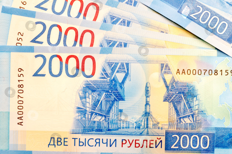 Скачать новые российские банкноты номиналом 2000 рублей крупным планом фотосток Ozero