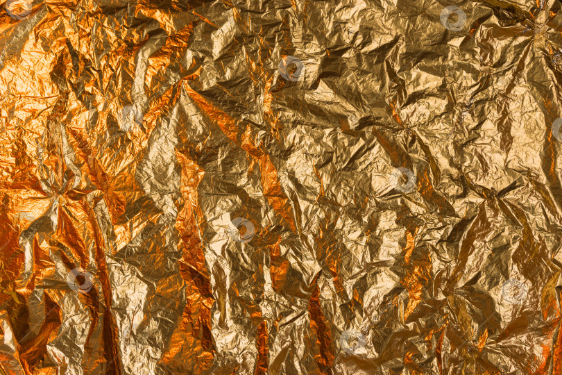 Скачать Фон с текстурой поверхности мятой золотой фольги фотосток Ozero