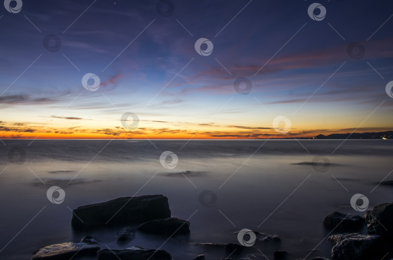 Скачать Закат над морем фотосток Ozero