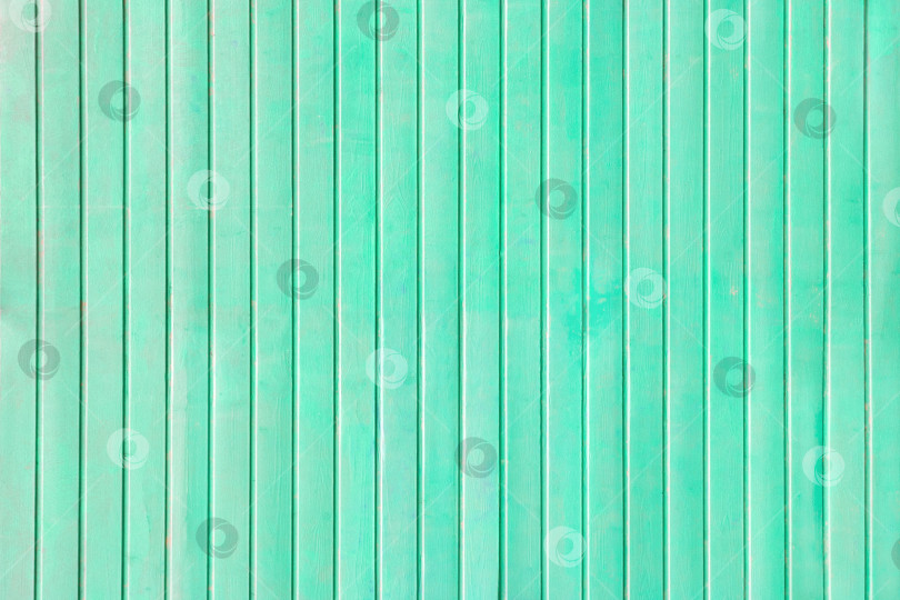 Скачать Вертикальные деревянные доски, окрашенные в бирюзовый цвет в качестве фона, текстура фотосток Ozero