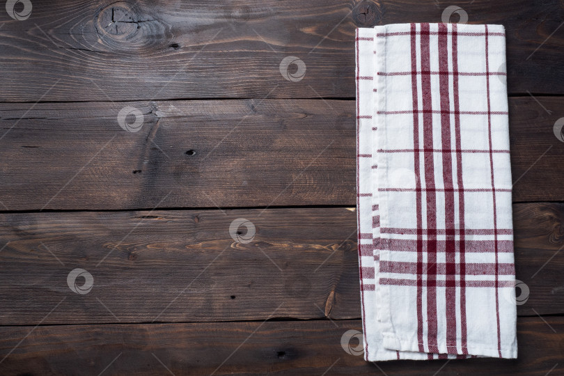 Скачать Текстильная салфетка-кухонное полотенце. Фон для деревянного стола в деревенском стиле. Место для копирования. фотосток Ozero