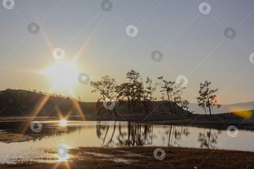 Скачать Закат в затопленной степи фотосток Ozero