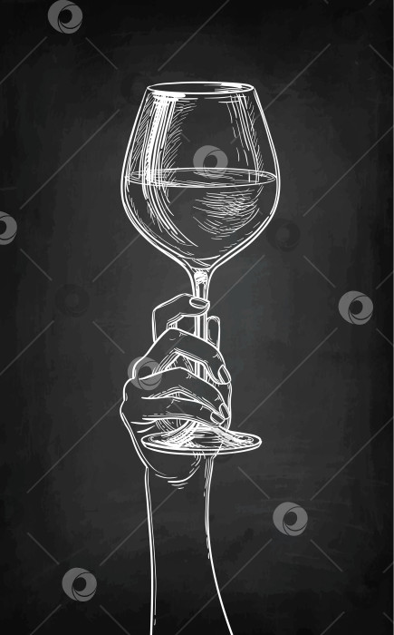 Скачать Рука, держащая бокал вина. фотосток Ozero