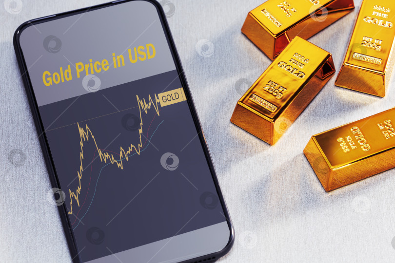 Скачать приложение с информацией о ценах на золото на экране смартфона и золотых слитках. фотосток Ozero
