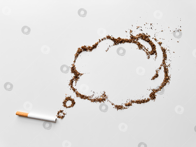 Скачать Сигарета с табаком в форме речевого пузыря на белом фоне, символизирующая отказ от курения и повышение осведомленности о своем здоровье. День без табака. фотосток Ozero