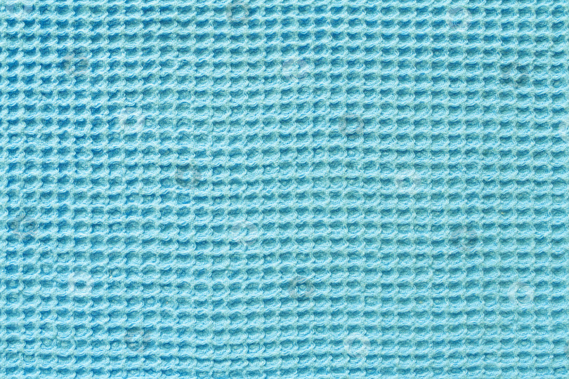 Скачать Крупный план бирюзовой вафельной ткани в качестве фона, текстура (абстрактная) фотосток Ozero